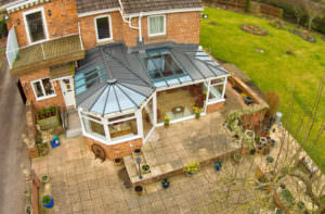 P Shaped Conservatory with Solid Roof